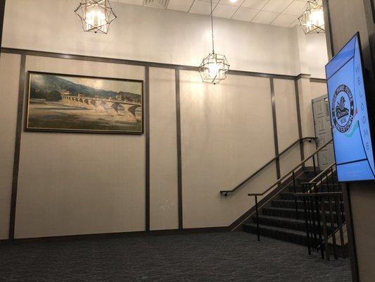 Lobby entrance with digital signage and ATM