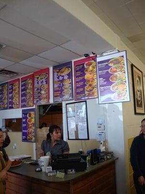 The Counter, The Staff, some of the Yelpers and The Menu at Carnitas Estilo Michoacan February 16th 2013 visit.