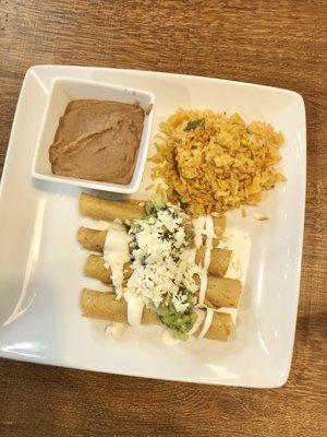 Flautas de Pollo with rice and beans