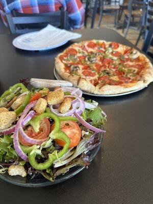 Green chile, pepperoni and mushroom pizza and house salad.