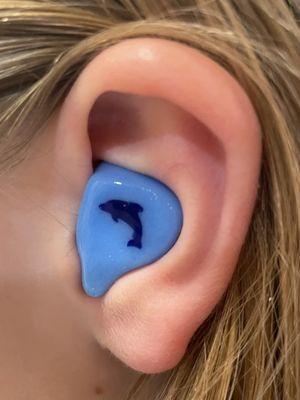 Custom floating swim plugs