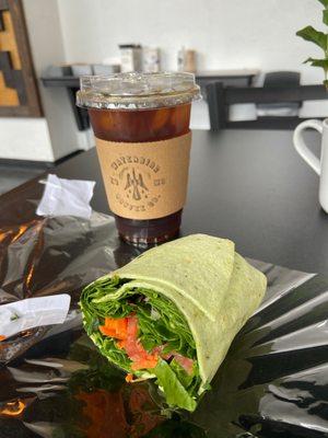 Delicious veggie wrap and cold brew coffee.