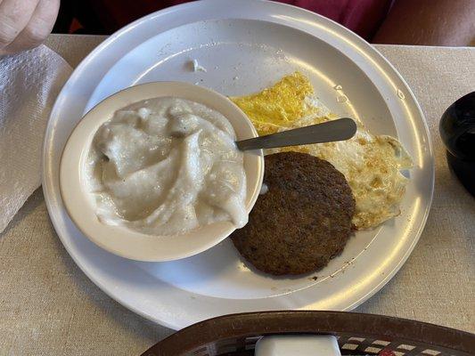 2 eggs over-hard, gravy, sausage patty.