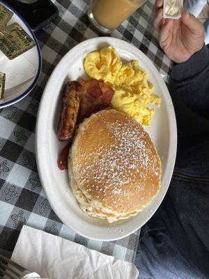 Eggs, bacon, pancakes and sausage