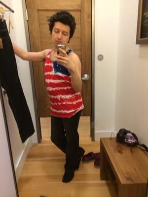 American flag tank top with original boot jeans.