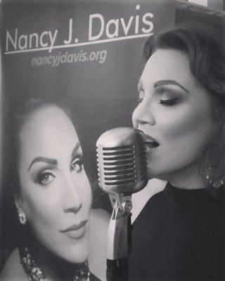 A fan took this photo at a restaurant of Nancy singing