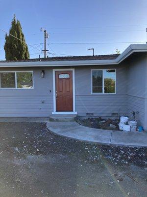 Front door with new curved sidewalk