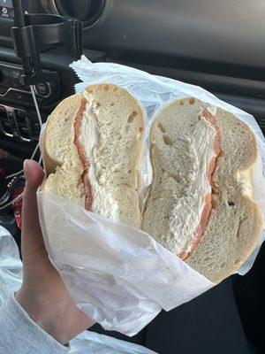 "Lox" cream cheese bagel with one tiny slice of lox