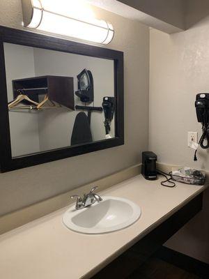 Bathroom, mirror, ironing board as well as hangers for my clothing.