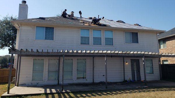 Our roof experts working on a home renovation project