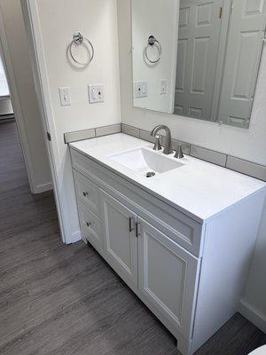 Bathroom with luxury plank vinyl flooring