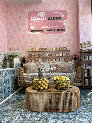 One of the seating areas with a selection of cards for sale