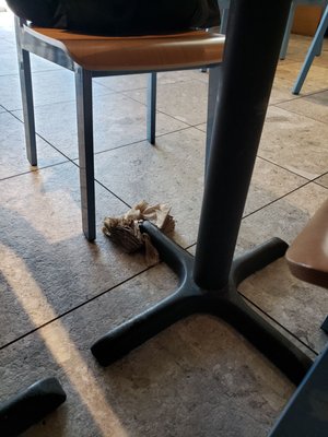 A stack of napkins keeps the table from wobbling.