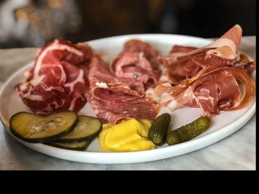 Three of the five charcuterie choices. Expertly prepared and presented with crusty bread.