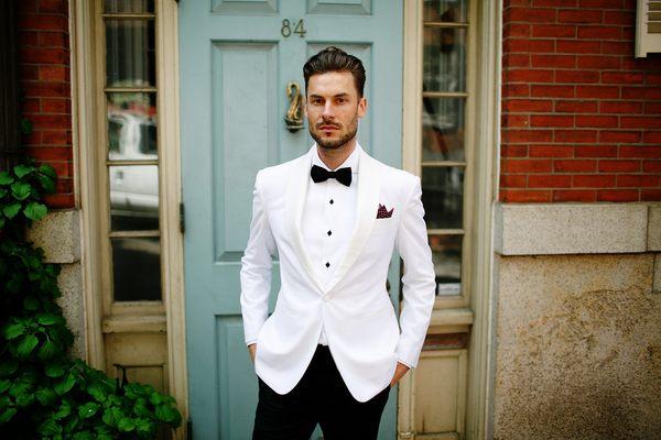 A white dinner jacket with black tuxedo pants is perfect for the upcoming holiday season. Spring 2016 Collection.