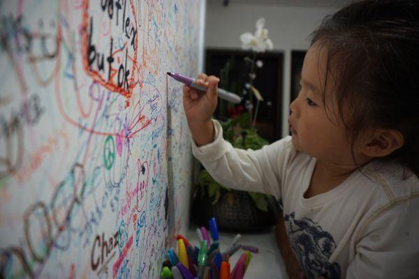 Signing the wall