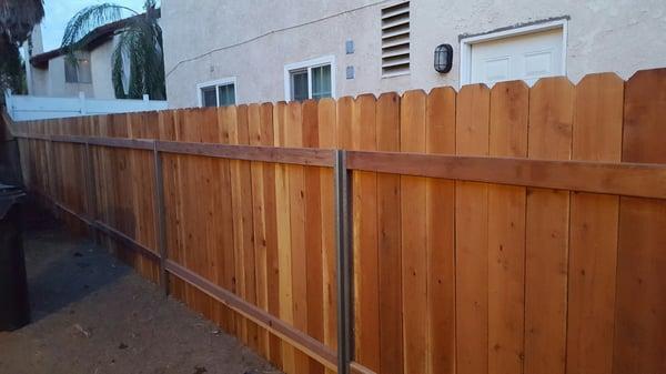 Shared fence.  Steel posts are on your side.