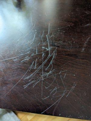 More fresh scratches on our tables from the movers