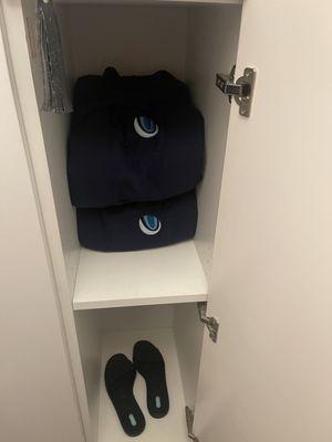 Locker with robes and slippers