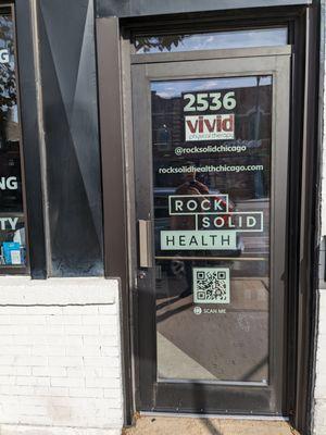 Front door entry to Vivid Physical Therapy at Rock Solid Health