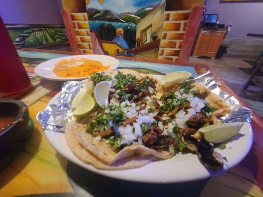 Steak tacos  Rice and beans