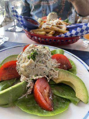 Chicken Salad with bib lettuce, tomato and avocado slices. Light vinaigrette drizzle.