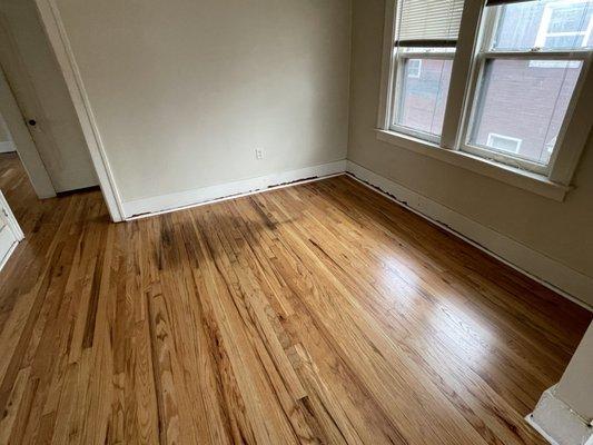 Big dark stain in room that was sanded, stained, and polyurethaned. Probably from their bucket of polyurethane. No word about it