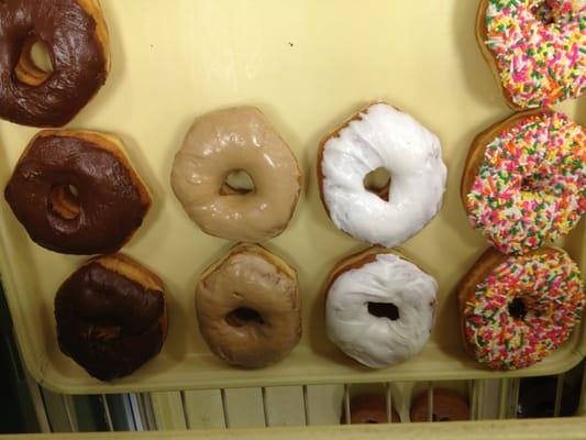 Fresh iced yeast donuts.