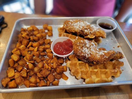 Chicken and waffles w/ breakfast potoates. The chicken was very tender and juicy and the waffle were to die for sweet and airy.