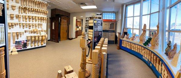 Wood Room full of hand-carved moldings, corbels, stanchions, appliques, kitchen island legs, and cabinetry