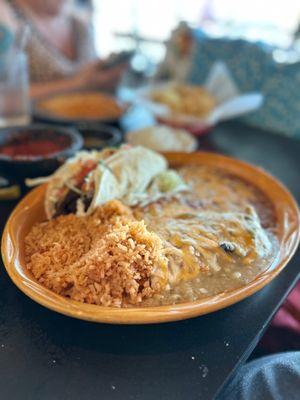 Al pastor taco, cheese enchilada, Chile rellano rice and beans