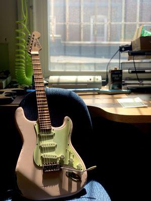 A beautiful candid of a guitar in our second floor electronic repair shop!