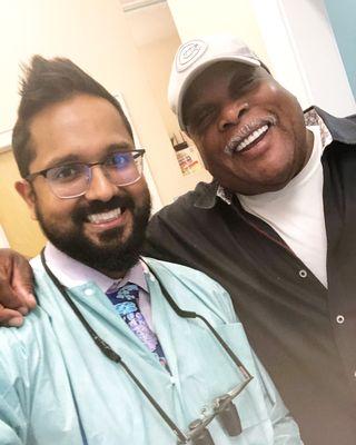 Happy patient immediately after his upper and lower all on 4 surgery