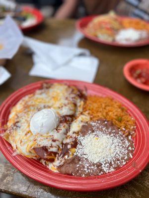 Beef enchiladas with beans and rice 7/10. I actually ate the beans, so it must be good!