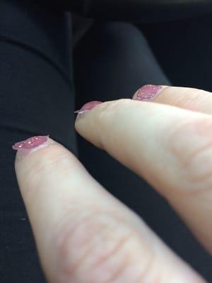 "Gel" nails peeling and lifting after 2 days!! Not only did my experience suck, but so does the quality.