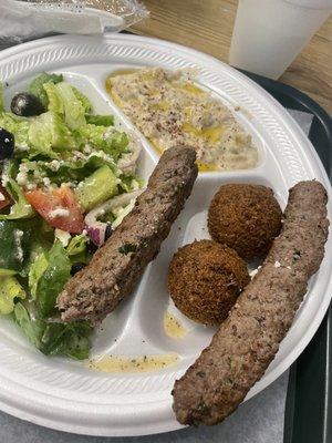 I moved some stuff around, it was plated better when i got it  but so delicious! Kofte with salad and falafel and baba ganoush