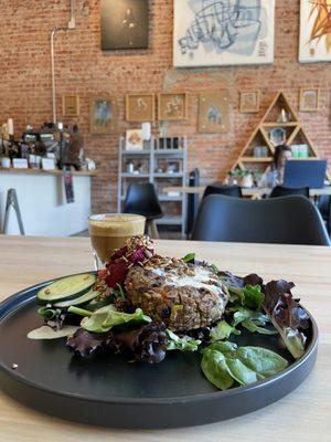 Salad, veggie patty, Cortado and front bar.