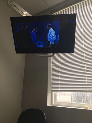 They have televisions in the examination room connected to Netflix.