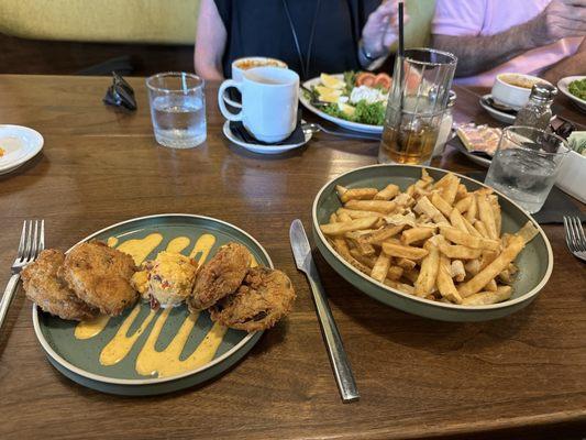 Fried green tomatoes with pimento cheese and truffle Parmesan fries