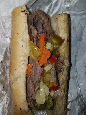 Italian beef dipped with spicy giardiniera