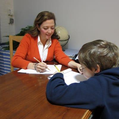 Founder Liz Craynon, working with a student