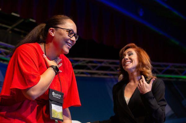 Two of Hawthorne's leaders get on the stage at Leadership Conference to teach about Living The Difference.