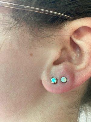 2nd top white  lobe piercing