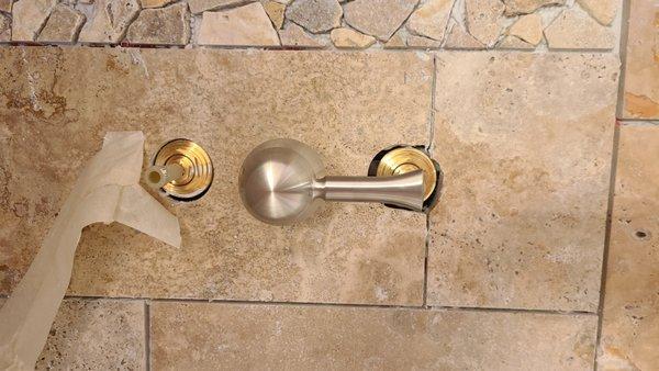 Controls too close to put handles on. This tile and backer board had to be torn out and replaced.