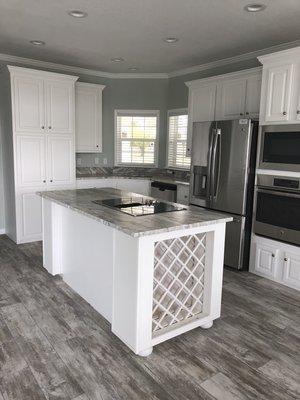 Fantasy Brown Leathered Finish countertops with Chiseled edge island