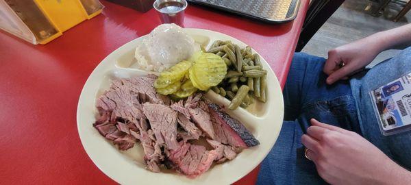 Brisket plate with mashed potatoes and green beans