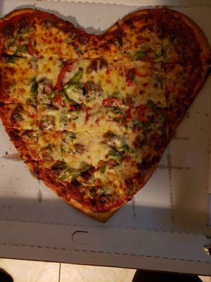 Heart-shaped pizza for Valentines day