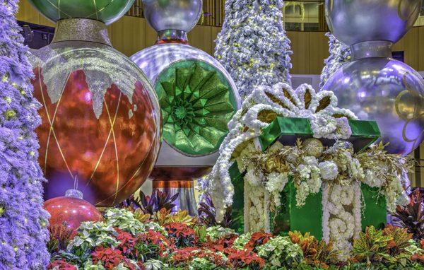 Step into a world of enchantment as you marvel at the grandeur and beauty of oversized presents and shimmering ornaments.