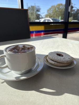 Cappuccino and a fruit tart.