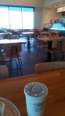 Inside Chipotle: clean, comfortable but some really loud music. Service was pleasant and efficient.